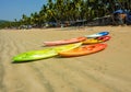 Colorful kayaks lying on the Palolem beach, Goa, India. Royalty Free Stock Photo